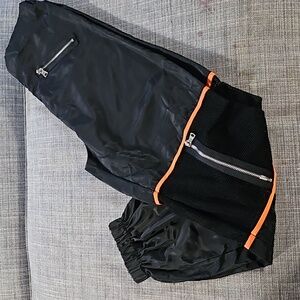 Black net knee zipper pants